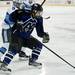 Pioneer High School sophomore Jason Maezes handles the puck in the game against Livonia Stevenson on Tuesday, March 5. Pioneer lost in double overtime 3-2. Daniel Brenner I AnnArbor.com